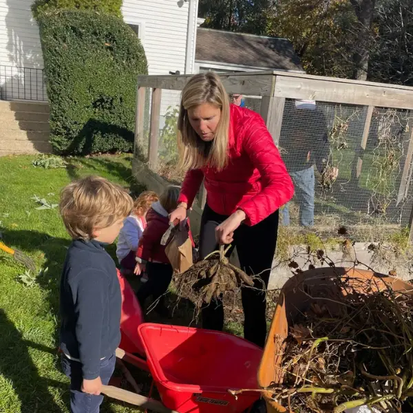 Parent gardening with child